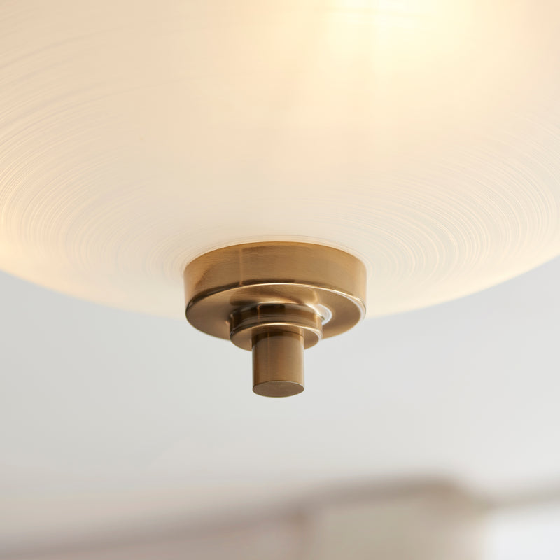 Close-up of the white glass on the Welles 3 Light Semi Flush Ceiling Light