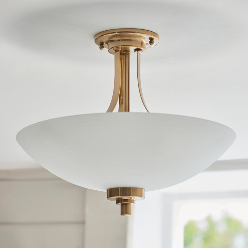 Detail of the brushed aged brass finish on the Welles 3 Light Semi Flush Ceiling Light