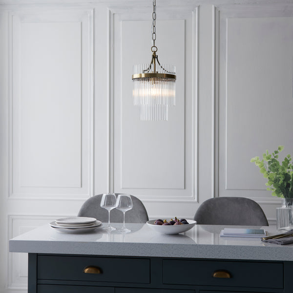 Marietta Pendant lit up in a styled hallway