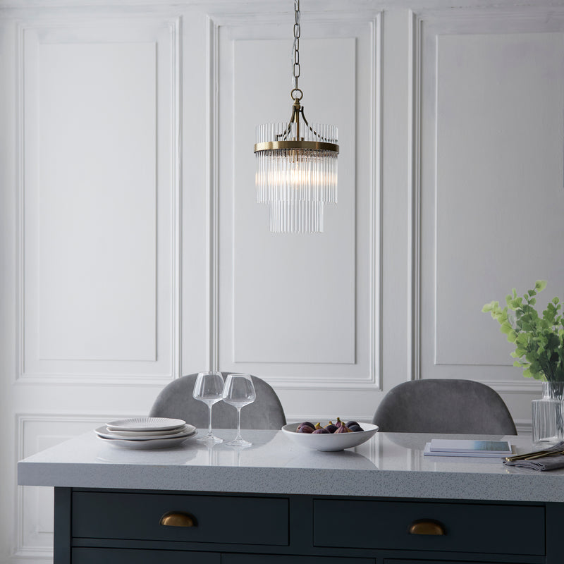 Marietta Pendant lit up in a styled hallway