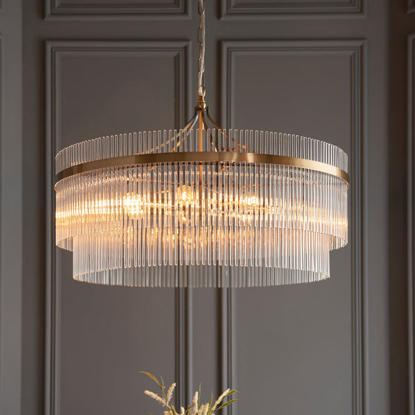 Marietta Grand 7 Light Chandelier lit up in a styled dining room
