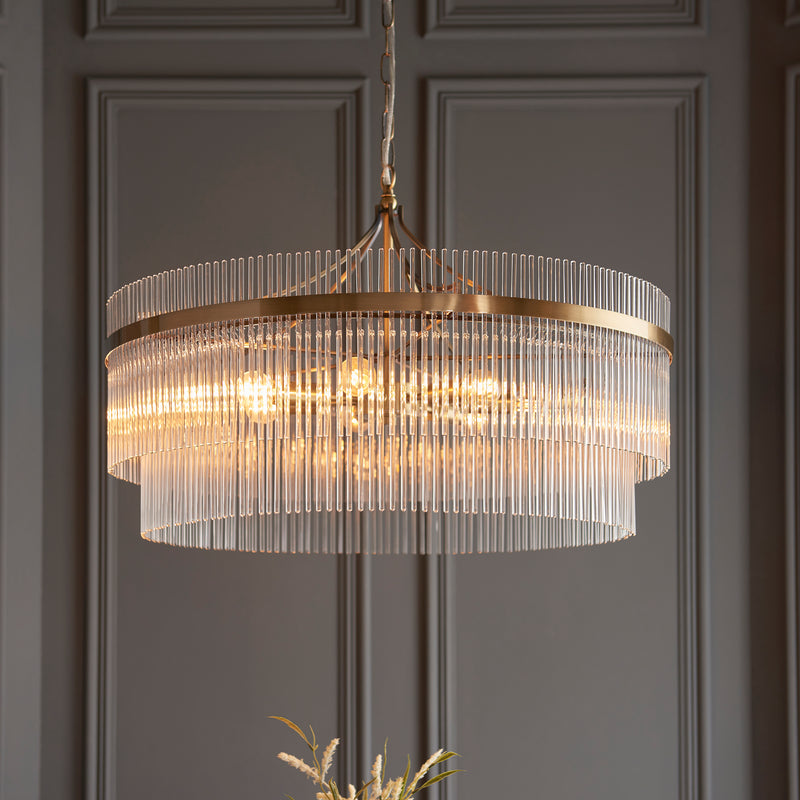 Marietta Grand 7 Light Chandelier lit up in a styled dining room