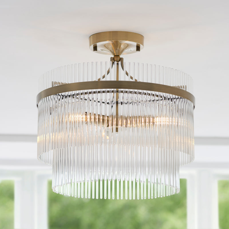 Marietta 3 Light Semi Flush Ceiling Light lit up in a styled bedroom