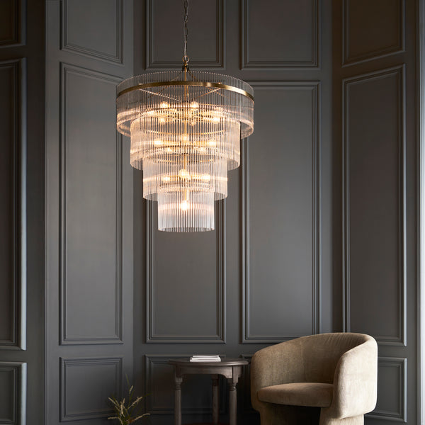 Marietta 16 Light Tiered Chandelier lit up in a styled hallway