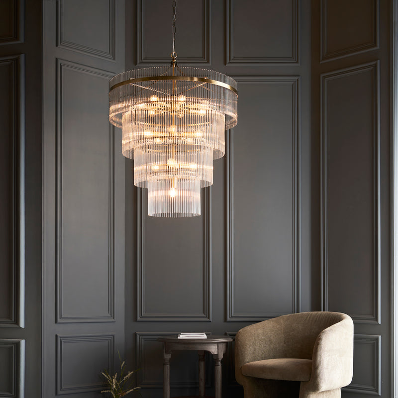 Marietta 16 Light Tiered Chandelier lit up in a styled hallway