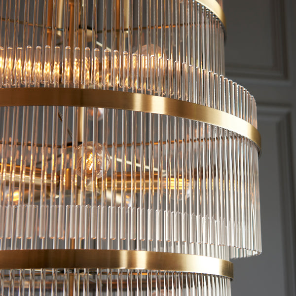Marietta Grand 21 Light Tiered Chandelier lit up in a styled stairwell