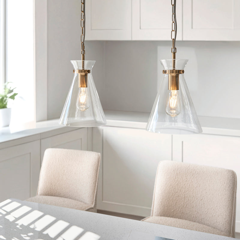 Harlow Pendant in brushed aged brass shown in a room setting