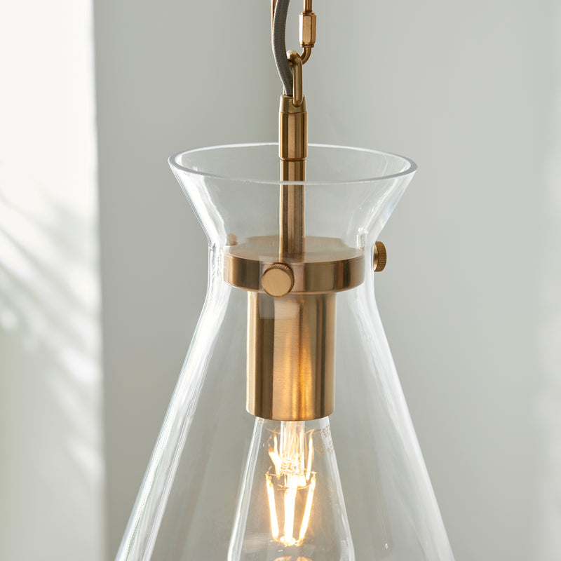 Detail of the brushed aged brass finish on the Harlow Pendant