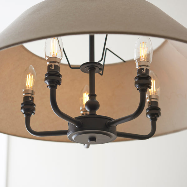 Lille 5 Light Pendant in matt black and natural linen shown in a room setting