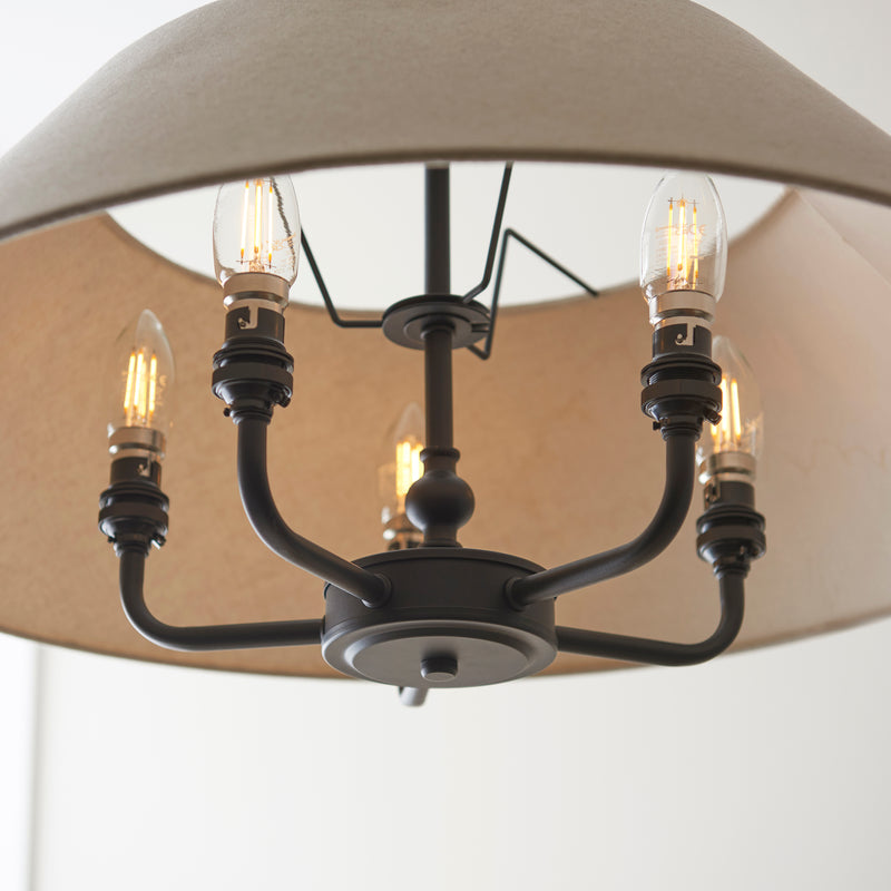 Lille 5 Light Pendant in matt black and natural linen shown in a room setting