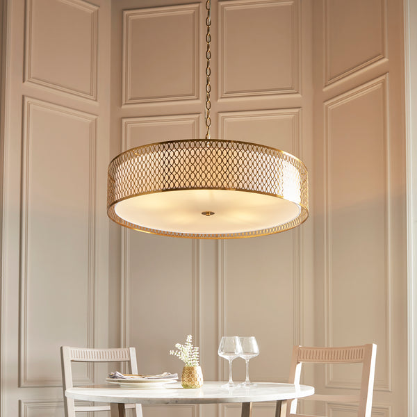 Cordero 5 Light Grand Pendant lit up in a styled living room