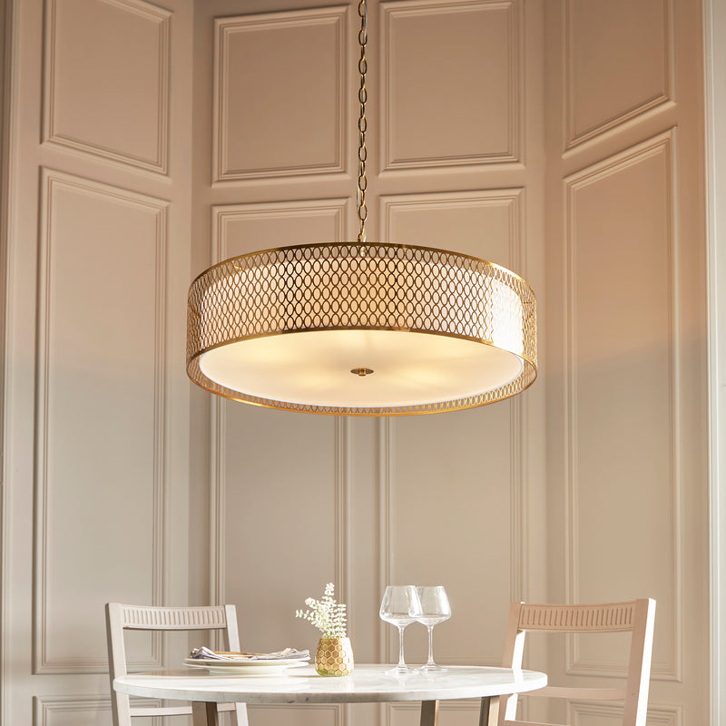 Cordero 5 Light Grand Pendant lit up in a styled living room