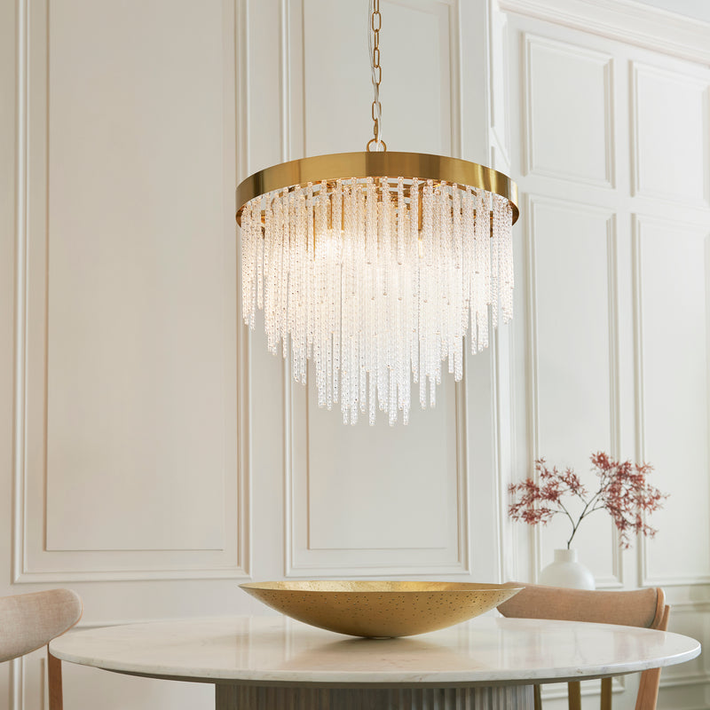 Anistoria 5 Light Chandelier lit up in a styled dining room