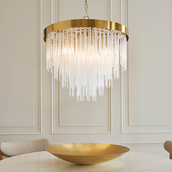 Anistoria 5 Light Chandelier in brushed aged brass shown in a room setting