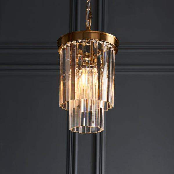 Conaston Pendant lit up in a styled hallway