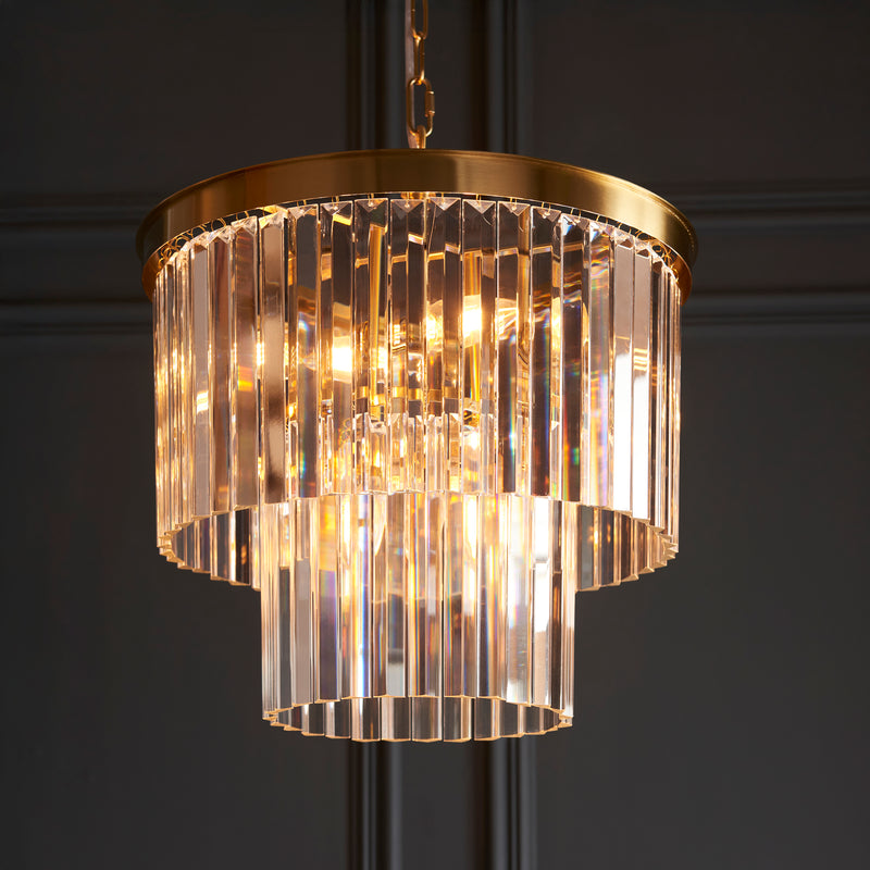 Conaston 4 Light Chandelier lit up in a styled dining room
