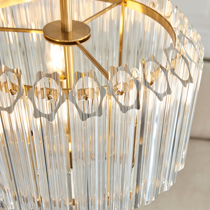 Detail of the brushed aged brass finish on the Valentina 3 Light Pendant