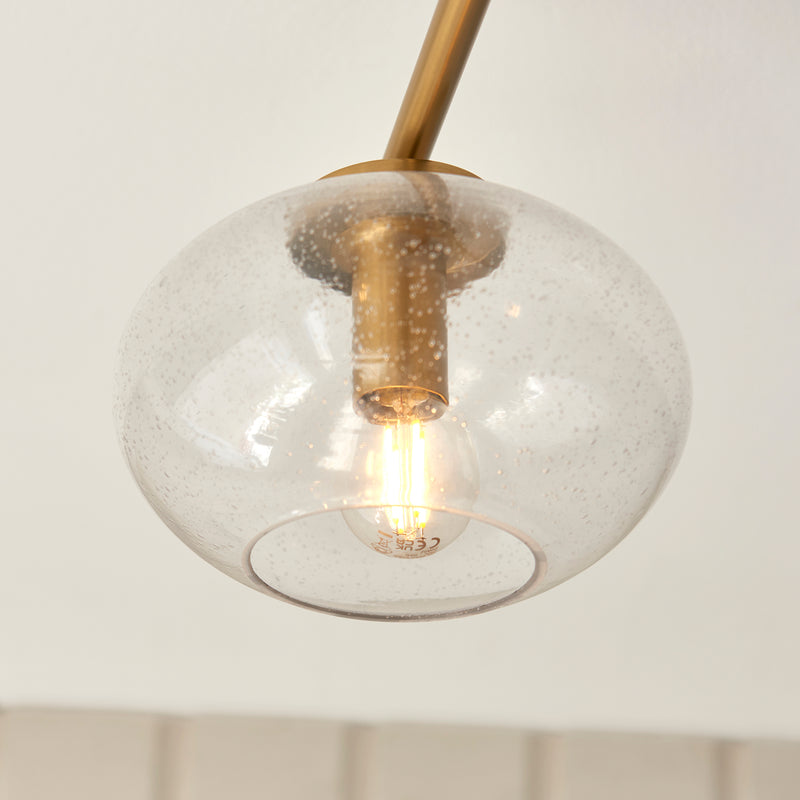 Detail of the warm brass finish on the Jacob 3 Light Semi Flush Ceiling Light