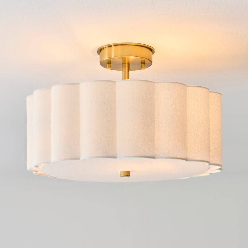 Serene 2 Light Flush Ceiling Light lit up in a styled bedroom