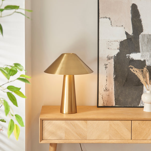 Endon Isak Table Lamp in brushed aged brass in a styled bedroom