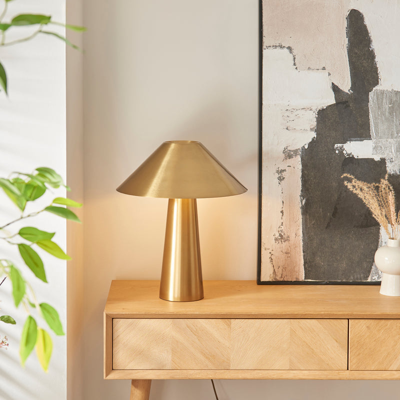 Endon Isak Table Lamp in brushed aged brass in a styled bedroom
