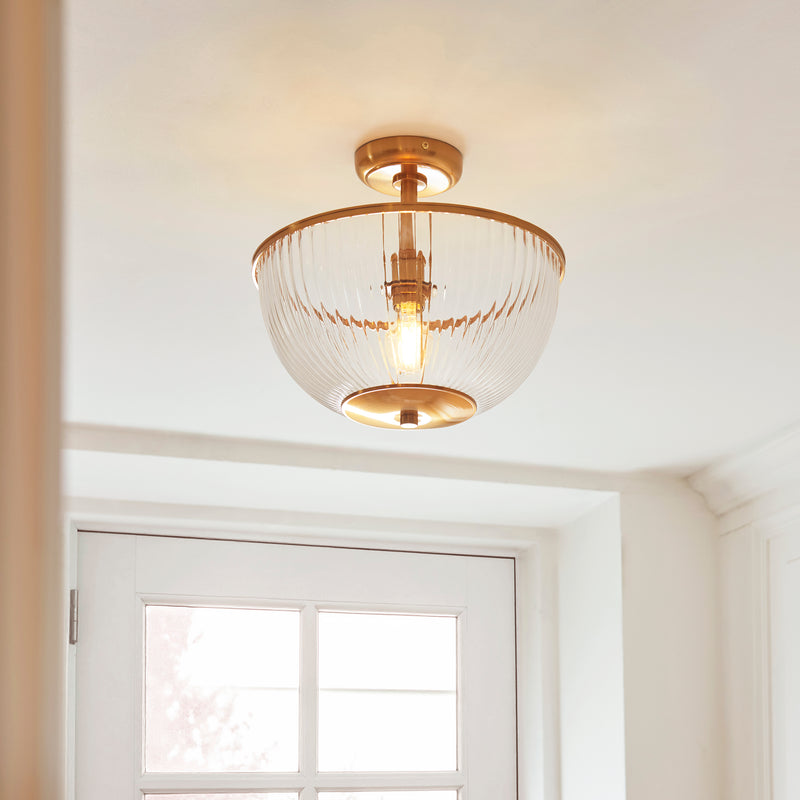 Somerset Uplighter Flush Ceiling Light in vintage brass on a hallway ceiling