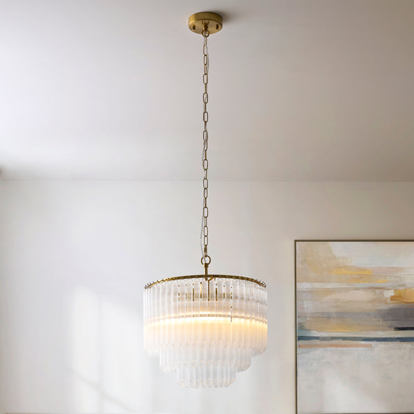 Montpellier 3 Light Chandelier lit up in a styled dining room