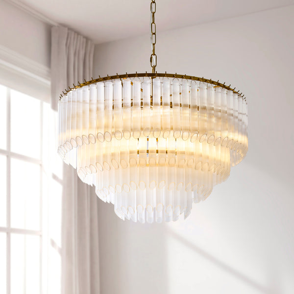 Montpellier 6 Light Chandelier in brushed aged brass shown in a room setting