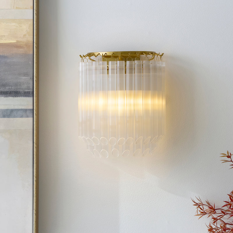 Montpellier Wall Light in brushed aged brass on a wall