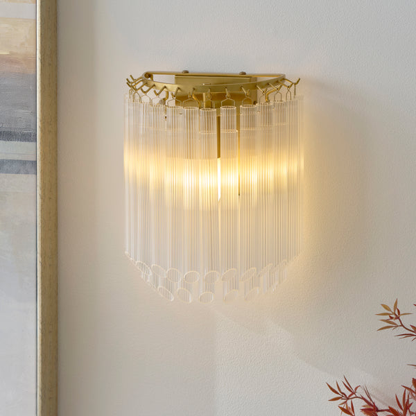 Montpellier Wall Light in brushed aged brass shown in a room setting
