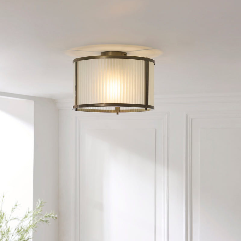 Ridgeton Frosted Flush Ceiling Light in antique brass on a hallway ceiling