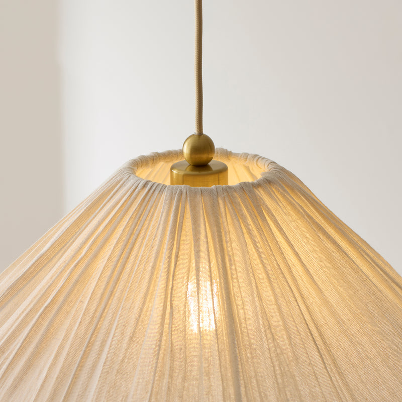 Detail of the brushed aged brass finish on the Isabella Pendant