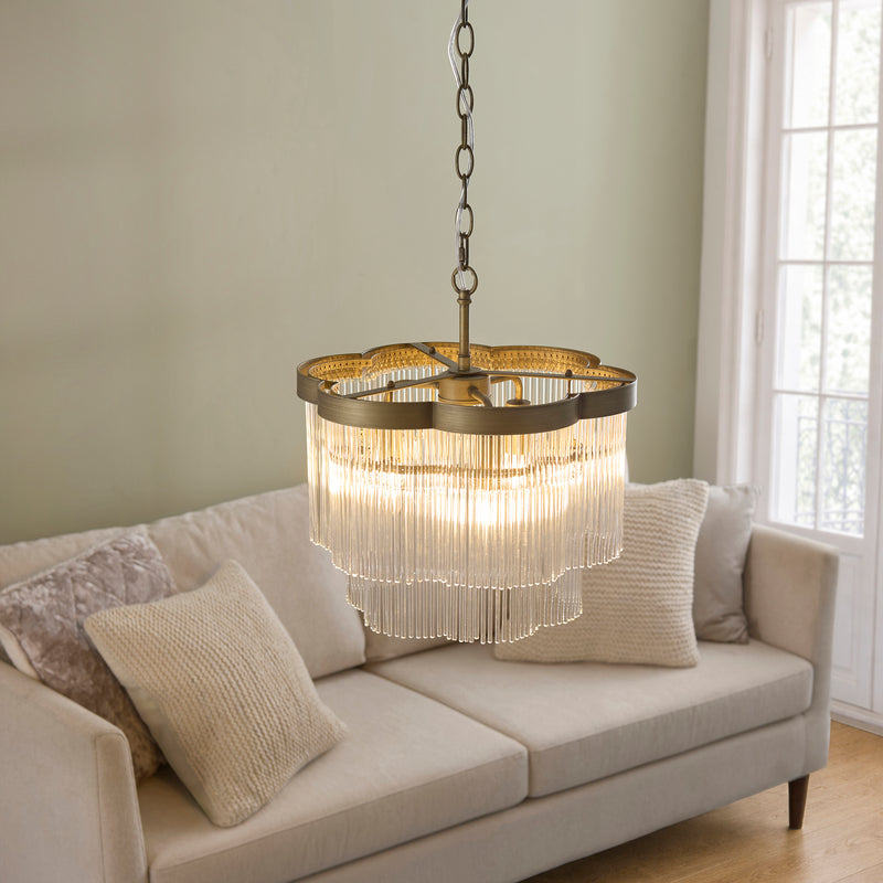 Lucille 3 Light Chandelier lit up in a styled bedroom
