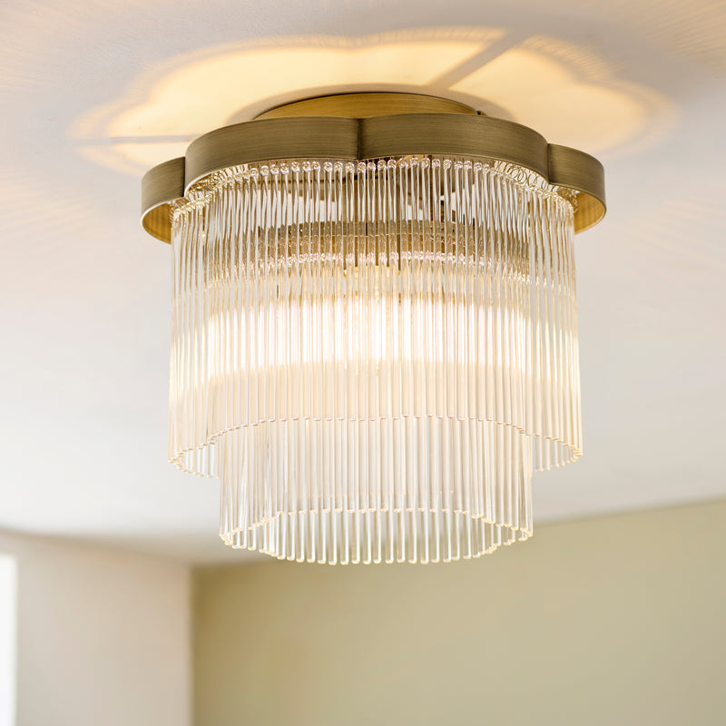 Lucille Flush Ceiling Light in antique brass shown in a room setting