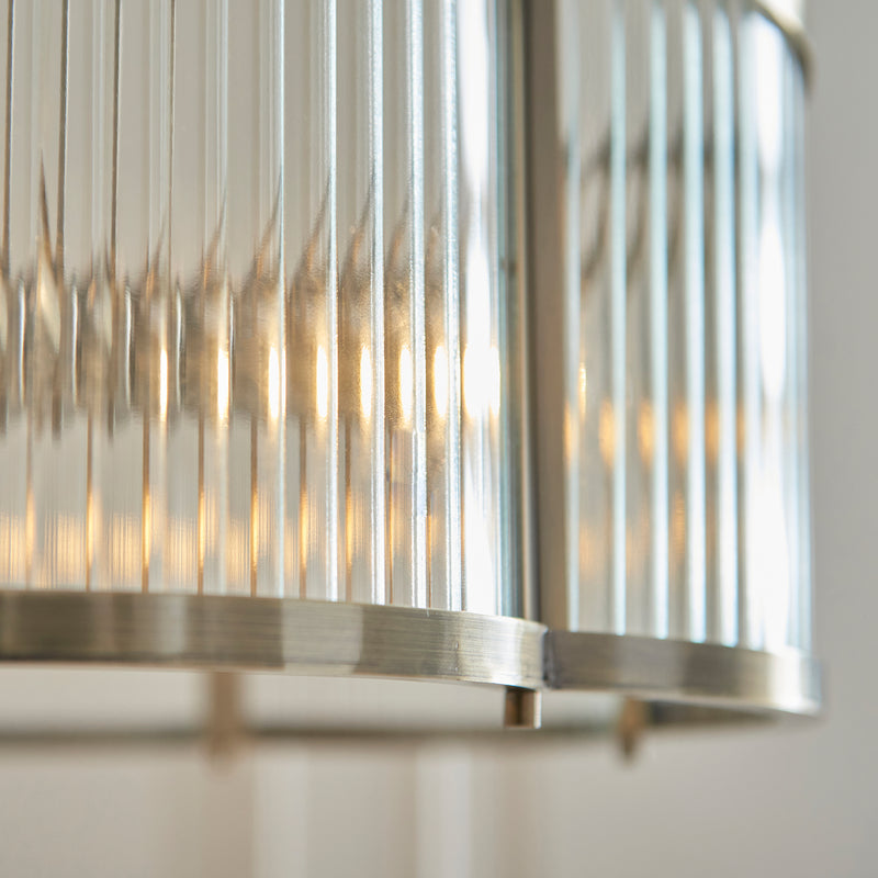 Close-up of the clear ribbed glass on the Ridgeton Scallop 3 Light Pendant
