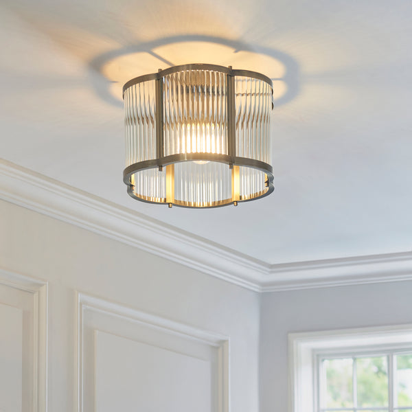 Ridgeton Scallop Flush Ceiling Light in antique brass on a hallway ceiling