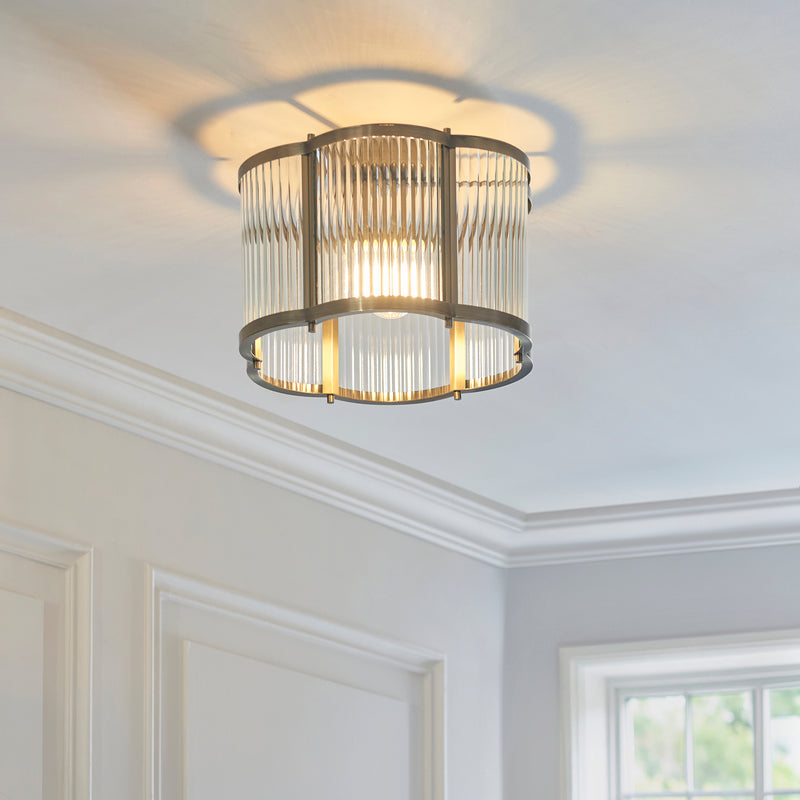 Ridgeton Scallop Flush Ceiling Light in antique brass on a hallway ceiling