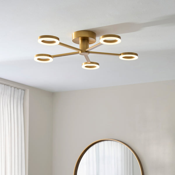 Scout 5 Light LED Semi Flush Ceiling Light in warm brass on a living room ceiling