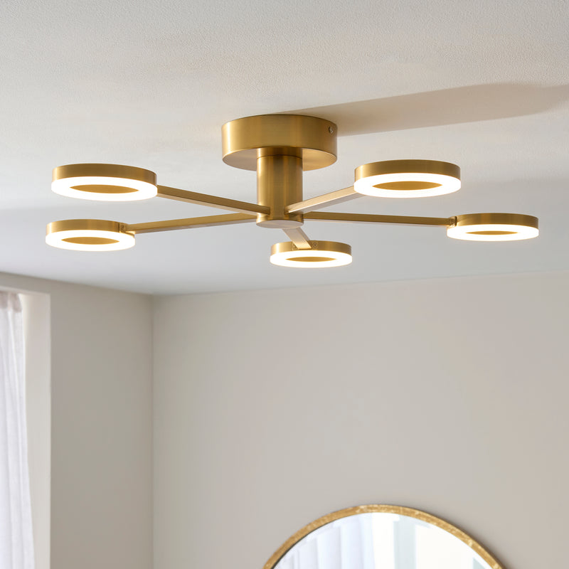 Scout 5 Light LED Semi Flush Ceiling Light lit up in a styled living room