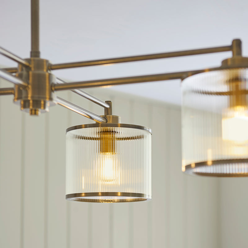 Detail of the antique brass finish on the Ridgeton 4 Light Pendant