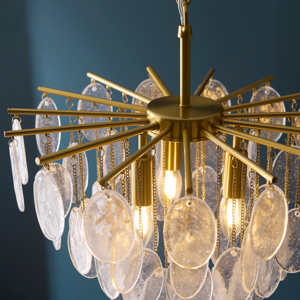 Loretta 3 Light Pendant in brushed aged brass shown in a room setting