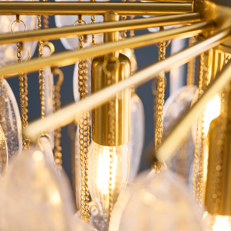 Close-up of the clear bubble glass on the Loretta 3 Light Pendant