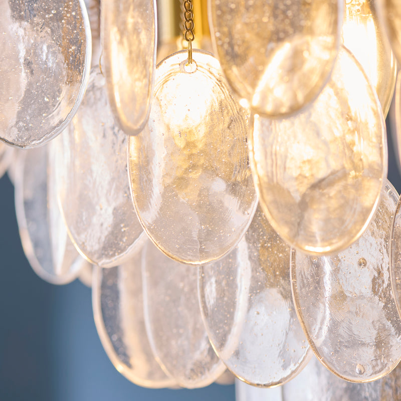 Close-up of the clear bubble glass on the Loretta 5 Light Pendant