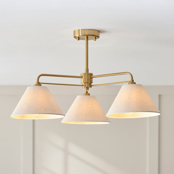 Wallbridge 3 Light Semi Flush Ceiling Light in brushed aged brass shown in a room setting