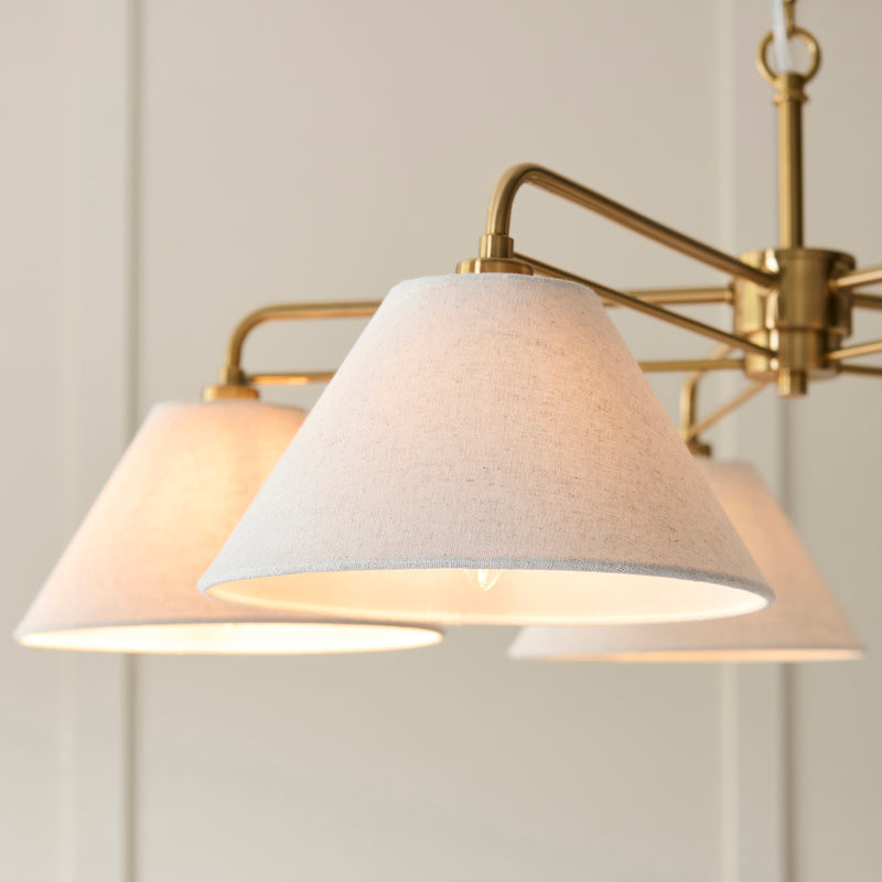Detail of the brushed aged brass finish on the Wallbridge 5 Light Chandelier