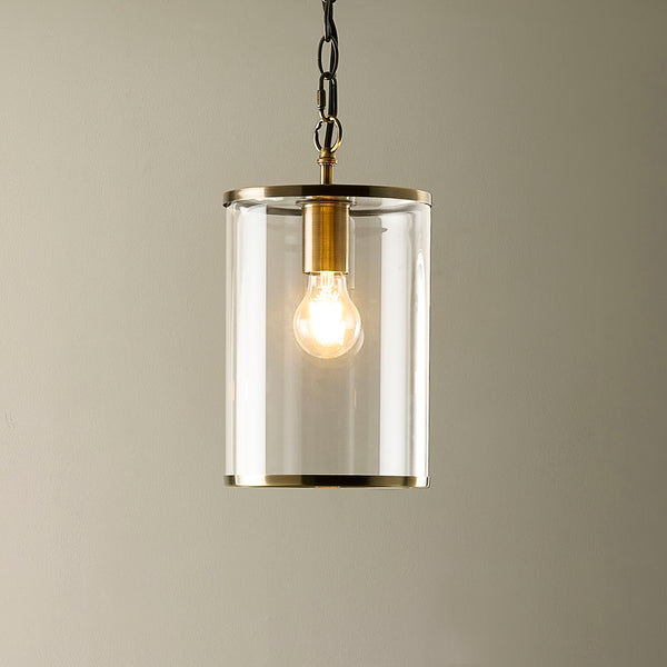 Hebden Pendant in antique brass shown in a room setting