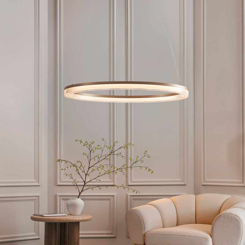 Lansina LED Hoop Pendant lit up in a styled living room