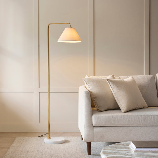 Endon Wallbridge Floor Lamp in aged brass and white marble in a styled living room