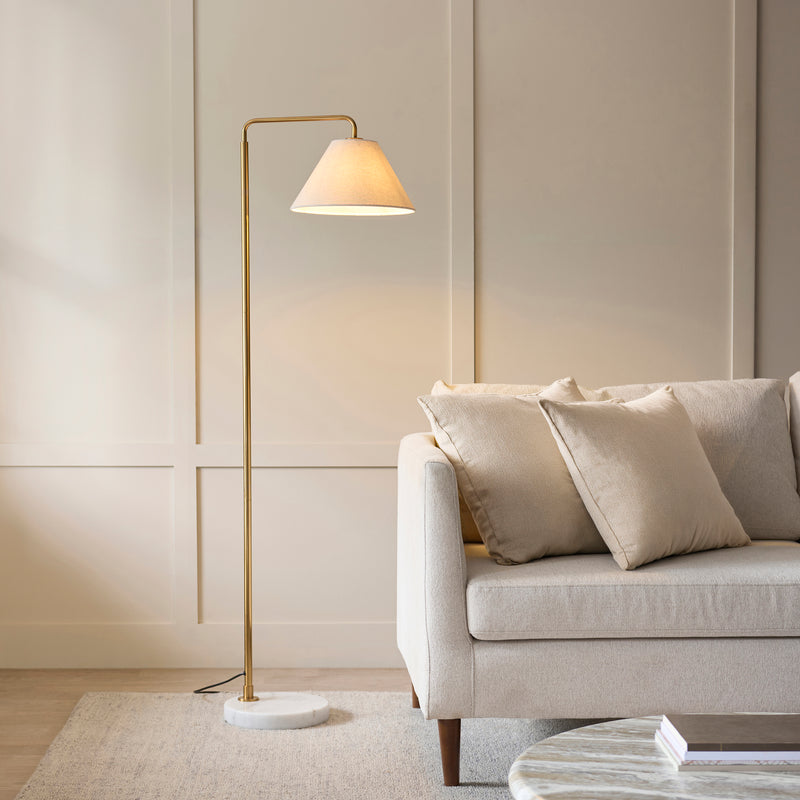 Endon Wallbridge Floor Lamp in aged brass and white marble in a styled living room