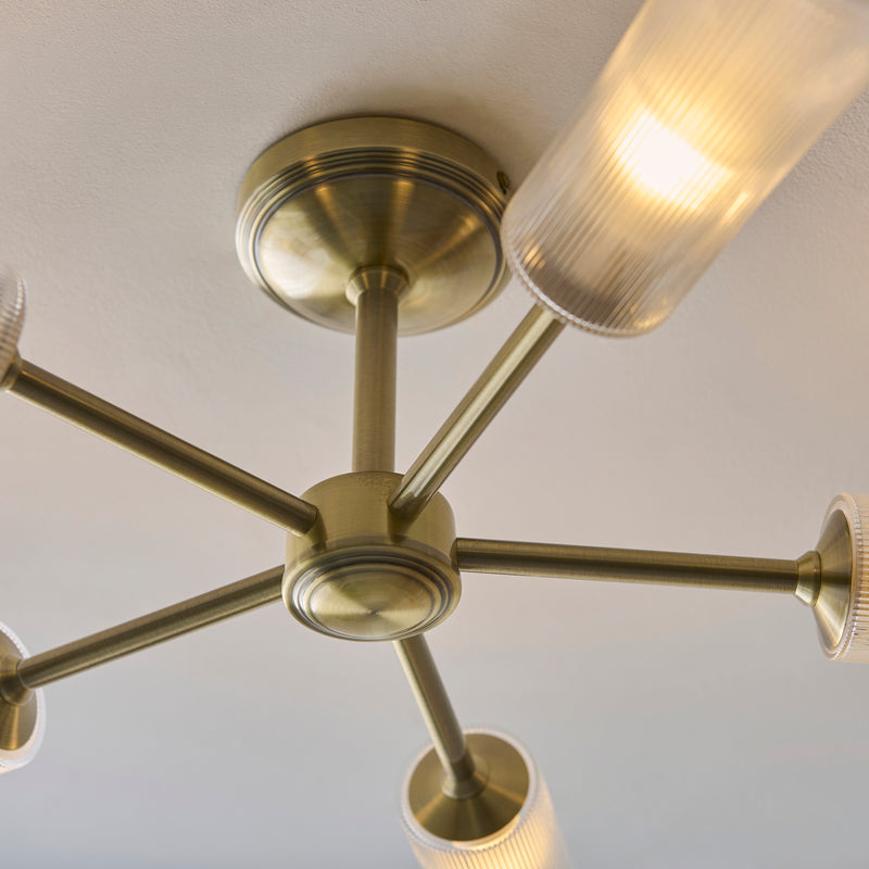 Detail of the antique brass finish on the Avelyn 5 Light Semi Flush Ceiling Light